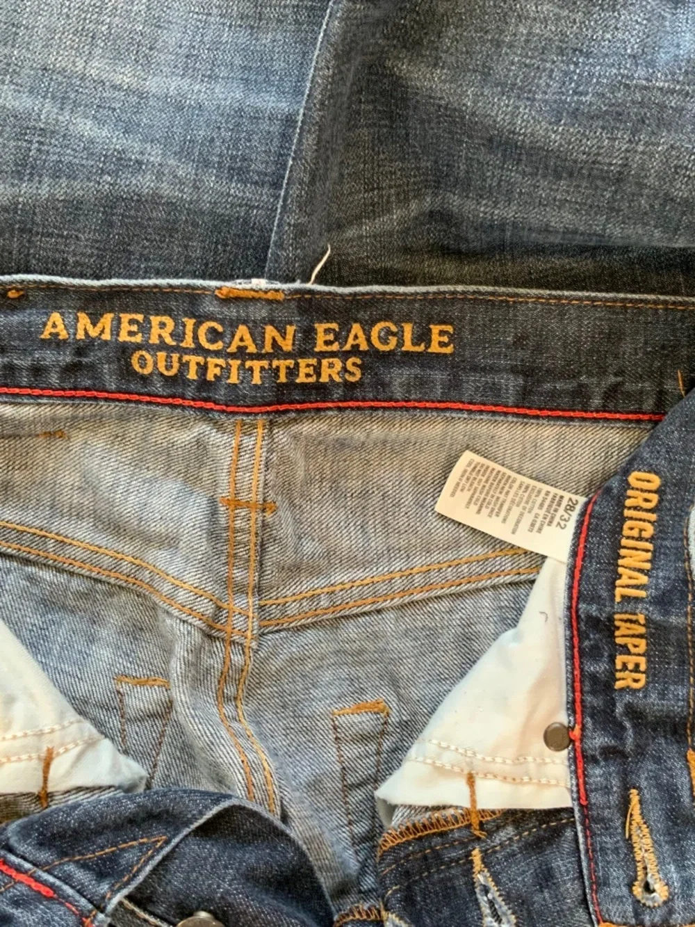 American Eagle Original Taper Distressed Jeans